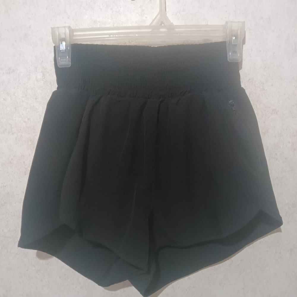 B black running shorts, zipper pocket active brief lined size small